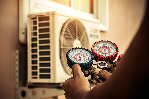 Professional Hvac technician working in Inwood, NY